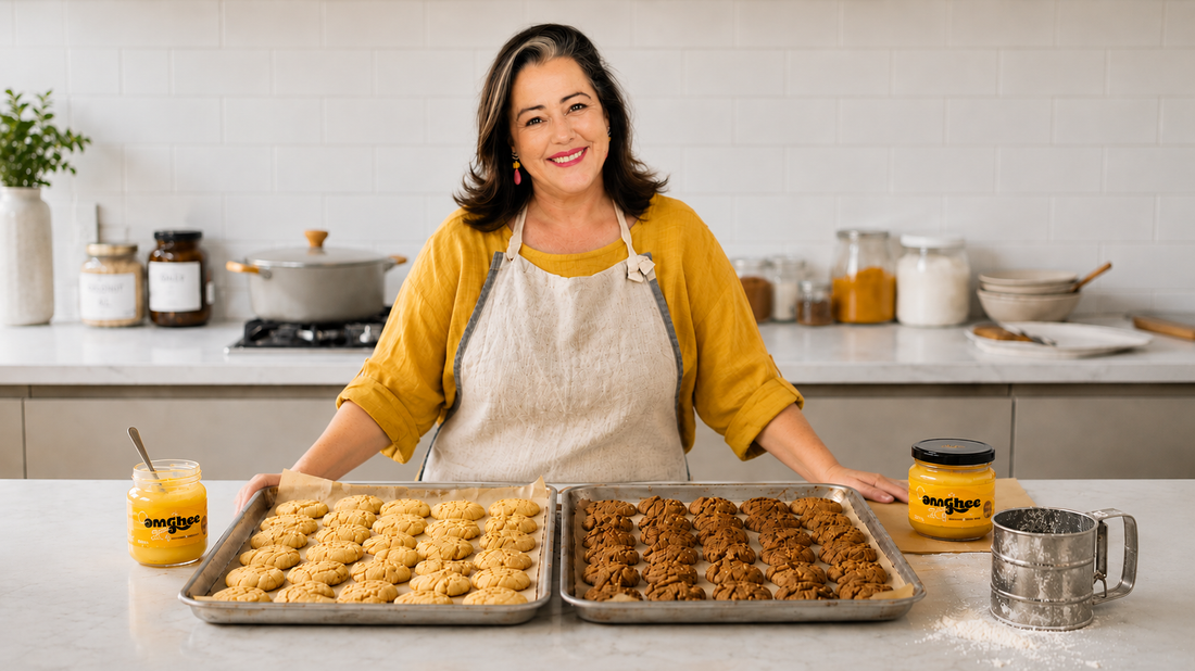 Ghee Maker standing behind kitchen bench with cookies made with ghee.