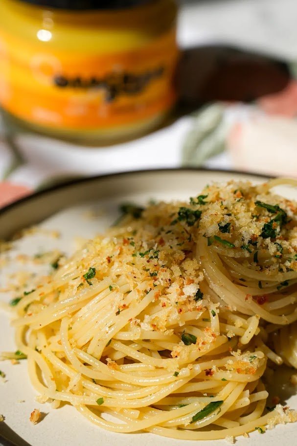 lemony spaghetti topped with garlic pangratto